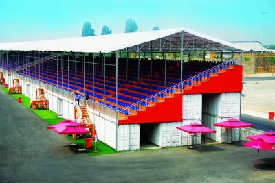Provides a cluster of grandstand containers that can be used for various sporting, cultural, or recreational events